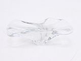 a clear glass object with a bow on top of it