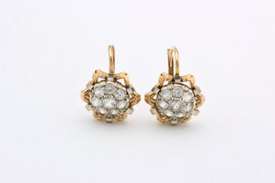 an image of a pair of gold and diamond earrings