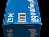 a blue box that is sitting on a black surface