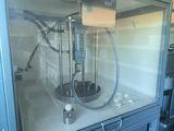 a machine that is sitting inside of a glass case