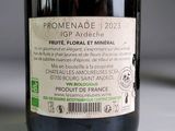 a bottle of wine sitting on a table with a label on it