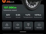 a close up of a cell phone with a motorcycle on the screen