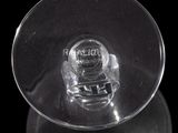 a close up of a glass object with a clock on it