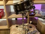 a drum set up on a table in a room