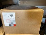 a box that is sitting on top of a pile of boxes