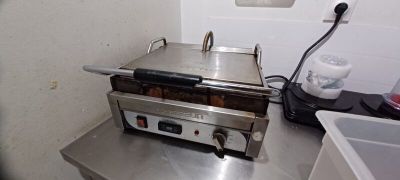 an image of a toaster sitting on a table in a kitchen