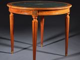 une image d'une petite table avec un plateau en marbre