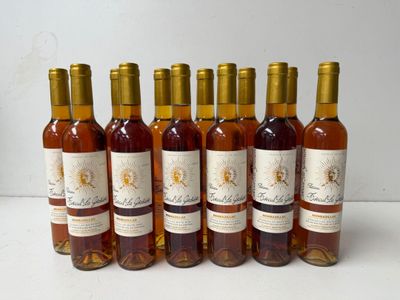 six bottles of wine are lined up in a row