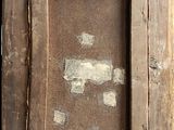 an old picture frame with a picture of a cat on it