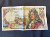french 50 francs bank note with a portrait of a man in a wig