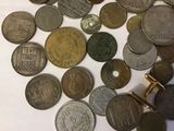 a lot of coins that are on the table