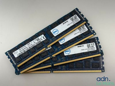 a group of four memory modules sitting on top of each other