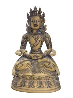 a gold statue of a buddha sitting on a lotus position