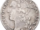 une pièce d'argent portant une tête de femme et une couronne