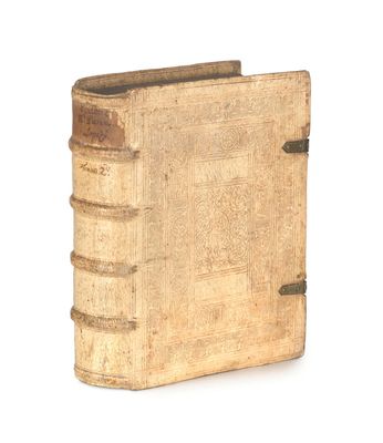 an old book that is sitting on a table