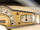 a close up of a car dashboard with a speedometer