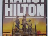 an old movie poster of a group of men standing on top of a wooden fence