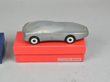 two toy cars that are sitting on top of each other