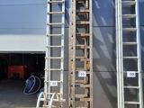 three ladders that are standing next to each other