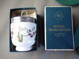 a small cup in a box on a table