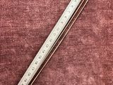 a ruler that is laying on top of a piece of cloth