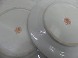 two plates that are sitting next to each other on a table