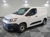 a picture of a white van parked in a room