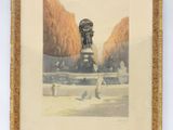 photo encadrée représentant une peinture d'une statue dans un parc