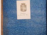 a blue book with a picture of a castle on it
