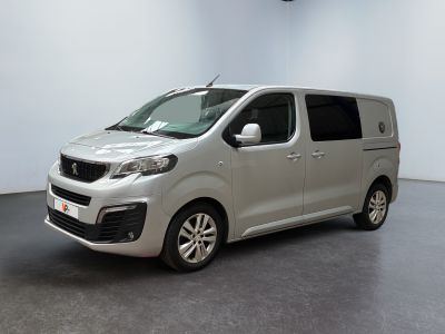 a picture of a silver van parked in a room