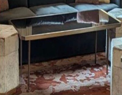 an image of a living room with a couch and a coffee table