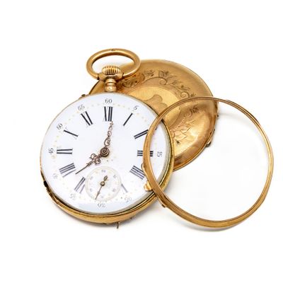 a gold pocket watch with a white face and roman numerals on it