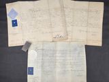 un lot de trois vieux papiers portant des traces d'encre bleue