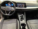 the interior of a car with a steering wheel, dashboard, and dashboard controls