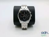 an image of a watch sitting on top of a black watch band