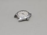 an image of a watch sitting on top of a white table