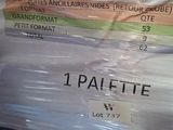 a person holding a plastic bag with a label on it