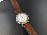 a close up of a wrist watch on a table