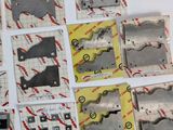 many pieces of paper that have been cut into pieces