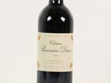 a bottle of wine that is sitting on a table