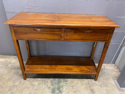 an image of a wooden table with two drawers on top of it