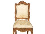 an image of a wooden chair with a beige upholstered seat