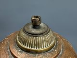 an image of a vase with a lid on a table