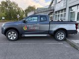 the truck is parked in the parking lot outside of the building
