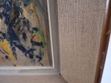a picture of a painting in a frame on the wall