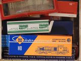 a box with a bunch of different types of toys in it