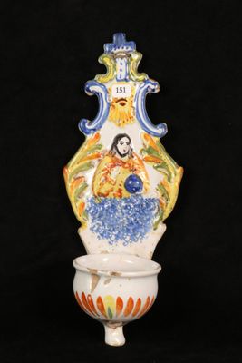 a vase that has a picture of a woman on it