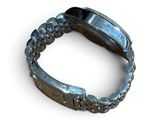 an image of a metal bracelet with a metal clasp on a white background