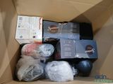 a cardboard box filled with different types of items