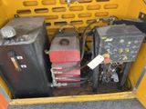 a yellow box with a bunch of different types of electrical equipment